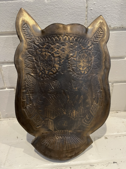 For the second version of the owl vase, I tried wiping the glaze away from the eyes and other highlights, but instead of letting the light clay body show through, they went dark almost black. Although not as striking as the pure gold version, it gives the piece a tarnished, weathered look