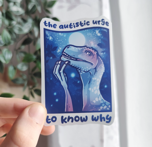 Hand holding up a sticker of a dinosaur pondering while looking up the starry night sky, titled "the autistic urge to know why"