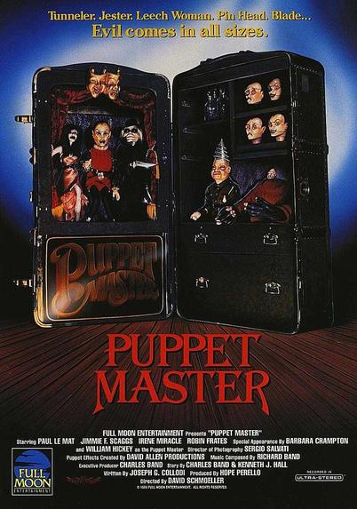 The poster for Puppet Master (1989) has the tagline “Tunneler. Jester. Leech Woman. Pin Head. Blade... Evil comes in all sizes.” and shows an open, backlit trunk full of creepy wooden puppets—all of whom look ready to belt out the lyrics “I've got no strings to hold me down / To make me fret, or make me frown / I had strings, but now I'm free / There are no strings on me”