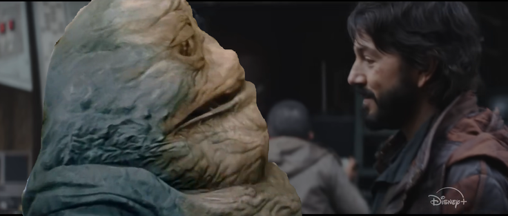The scene from Andor S1E1 with Nurchi meeting Andor, but Nurchi is replaced with the 1997 CG Jabba the Hutt, who looks like he's rendered in Unreal Engine 3.