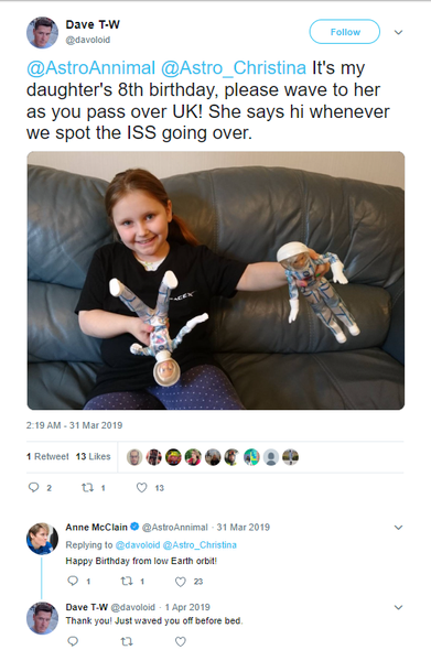 Screenshot of a tweet by me, 31/3/2019.  "@AstroAnnimal @Astro_Christina It's my daughter's 8th birthday, please wave to her as you pass over UK! She says hi whenever we spot the ISS going over.

Anne repiied: 

Happy Birthday from low Earth orbit!

Photo is off a girl wearing a black SpaceX tshirt, holding two Barbie astronauts, grinning from ear to ear.