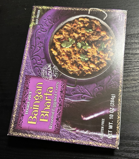 Purple frozen entree box made into cover of a notebook
