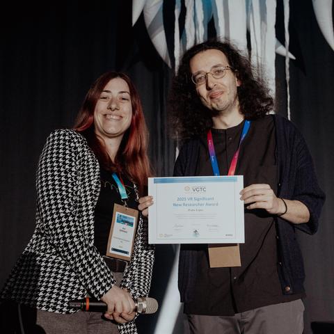 Pedro got the award from last year's winner, Dr. Serrano