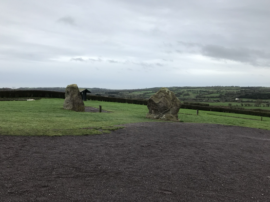 Standing stones near Newgrange on a cloudy day.