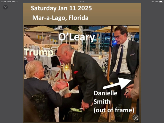 Donald is seated at a table in Mar-a-Lago. Kevin O’Leary is bending forward to kiss his ring. Danielle weight off to the right to be the next to kowtow to #Donald. The #LickspittleTeam is Danielle Smith, Kevin O’Leary, and Jordan Peterson.