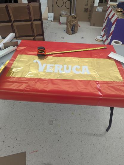 Veruca salt Wonka bar light box to be. Gold foil vinyl, wrapping paper, and tracing paper.