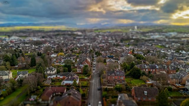 Tilt shift effect on aerial photography over town's housing areas