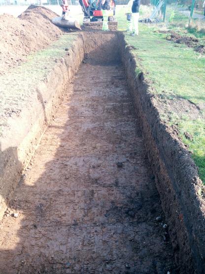 A freshly machine cut archaeological trench containing nothing but natural brickearth.