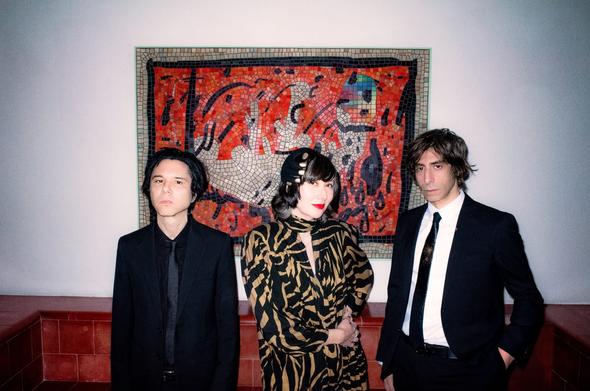 <img alt="Yeah Yeah Yeahs announce career-spanning &quot;intimate theater&quot; tour" src="https://theneedledrop.com/content/images/2025/03/Yeah-Yeah-Yeahs-by-Barnaby-Clay.jpeg" /><p>Indie rock trio <strong>Yeah Yeah Yeahs</strong> are planning a return to the road with a set of new dates. Spanning from mid-June to the end of July, the band will set off on a tour of &quot;intimate theaters&quot; across the UK, US, and Mexico. This year marks the band&apos;s 25th anniversary, and the tour is being touted as a &quot;retrospective and a celebration of their enduring musical legacy.&quot;</p><p>In a press release, frontwoman Karen O. says that the band (also consisting of Nick Zinner and Bryan Chase) will be digging into their entire discography for these shows, which will be performed alongside strings, piano, and acoustic guitar.</p><p>O. explains:</p><blockquote>&quot;To let our love light shine we will be digging deep into our back catalogue. We&#x2019;ll be playing songs that are rarely (if ever) performed, alongside all time favorites with new arrangements to delight...and yes there will be acoustic guitars and strings too. We&#x2019;d love for you to join us for these intimate performances in beautiful iconic theaters to celebrate 25 years of Yeah Yeah Yeahs, not a bad seat in the house!&#x200b;&quot;</blockquote><p>Yeah Yeah Yeahs haven&apos;t toured extensively since the shows surrounding their last record, 2022&apos;s <em>Cool it Down, </em>which was itself their first 