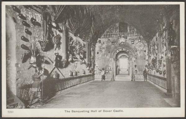 Printed monochrome postcard showing a view of the Banqueting Hall of Dover Castle at Dover in Kent.
Published by Gale & Polden Ltd, Wellington Series, No 7210, c.1905-10.
Postally unused.
Very good condition, with very slight corner bumps.