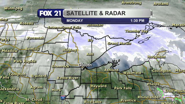 The satellite and radar over the Northland at 1:30 p.m. on Monday, March 17, 2025, shows snow showers moving across the Rainy River Basin and Arrowhead regions north of Highway 1.  The rest of the Northland is seeing a mixture of cloud cover and breaks of sunshine, especially in northwest Wisconsin.