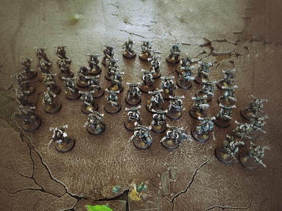 50 older chaos space marine infantry troops repainted to count as horus heresy blackshields.