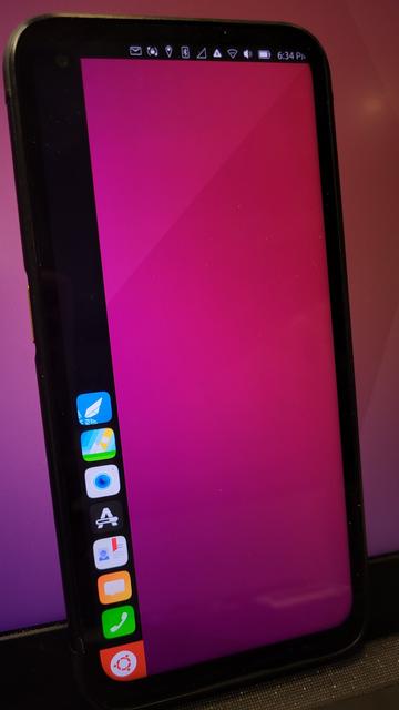 FLX1 running a beta build of Ubuntu Touch showing the home screen