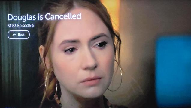 Karen Gillan is looking close to tears. Very upset.