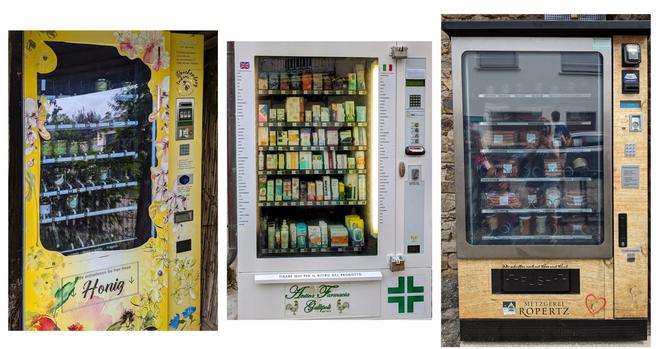 The image shows three vending machines in a collage, each offering different products.
On the left, a bright yellow vending machine with floral decorations features the word "Honig" (honey) and appears to sell jars of honey.
In the centre, a white vending machine with a green cross symbol and the text "Antica Farmacia" (Old Pharmacy) is stocked with various medicinal products.
On the right, a wooden-panelled vending machine labelled "Metzgerei ROPERTZ" (Ropertz Butcher) displays packages of meat products.
All three machines are depicted outdoors, suggesting they are accessible to the public.