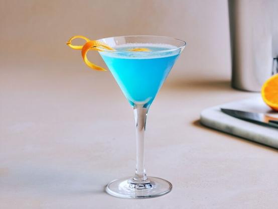 Blue Monday drink with orange twist