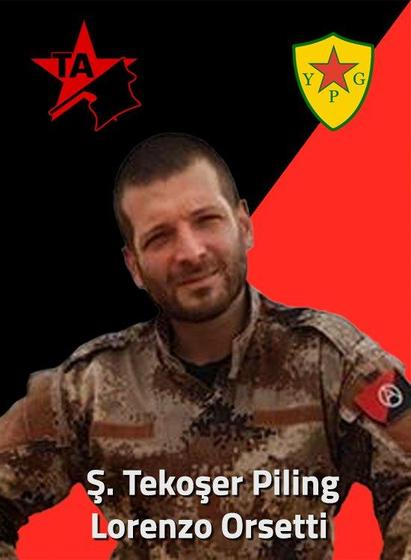 A photo of Lorenzo Orsetti, aka Orso, italian anarchist fallen in Rojava on the 18th of March 2019