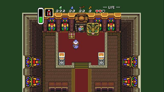An indoor scene within a video game. A character is standing in front of what appears to be a throne, with ornate carvings and an intricate design on the back wall. The room has arched doorways and a high ceiling. The perspective suggests first-person viewpoint from behind the character.