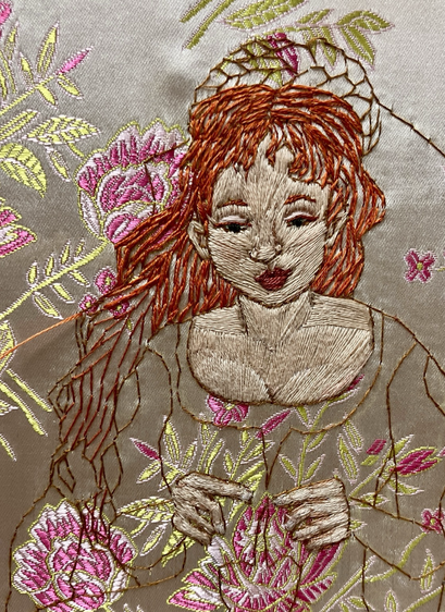 An embroidered portrait of a light skinned ginger woman on a cream and pink rose brocade fabric.