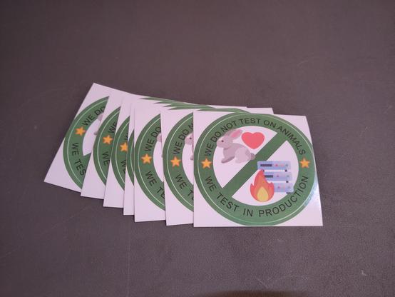 Sticker with the text "We do not test on animals, we test in production"