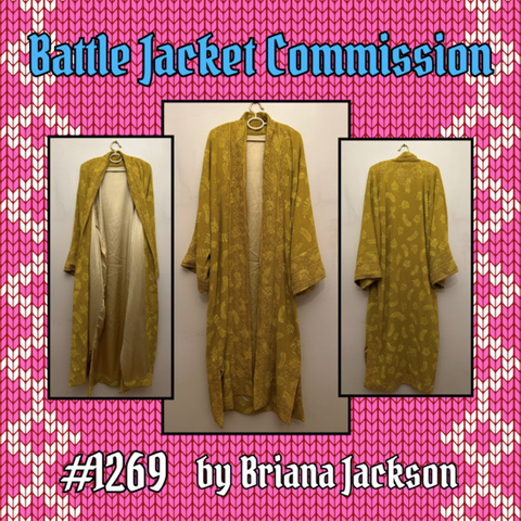 OFMD Craft Fair auction item 1269: Battle Jacket Commission, donated by Briana Jackson. 3 photos show a recreation of Stede's yellow robe/'Battle Jacket', hand-sewn and hand printed with a the floral design.