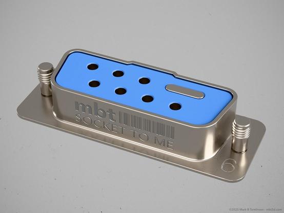 A metal electrical component similar to a rs232 but different.
Socket to me inscribed on the side.