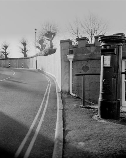 Castle road, photo on a linhof with unexpected vignette from too much rise movement. I’m an idiot.