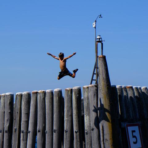 Child jump in the river