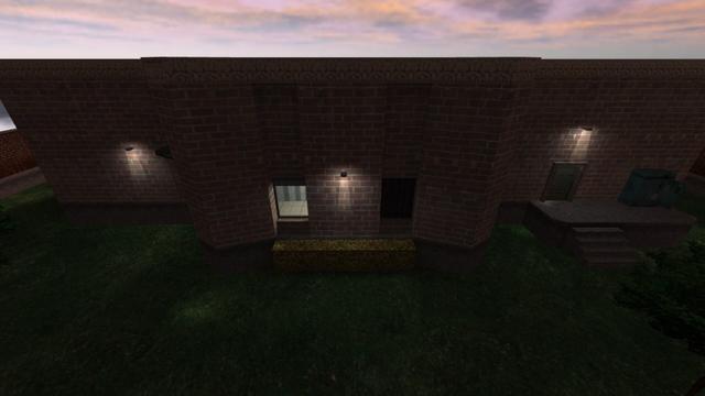 In this picture you can see the back of the estate. In the middle are two windows, both leading to a bathroom. The left of it is open. In front of it is a small hedge. Between the windows, a white-lit lamp is attached to the wall. The left and right sides of the walls are slightly recessed, so that the middle wall stands out. On the left wall is another white illuminated lamp attached to the wall. To the right of the lamp is a yellow ladder that leads to a platform on the first floor. On the right wall is a raised entrance with a blue door. Above it, another white-lit lamp is attached to the wall. To the right of the door is an electrical box. On the right edge of the picture, a tree peeks in. This is on the map cs_estate in the game Counter-Strike 1.6.