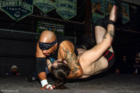 Homicide with a side headlock takedown