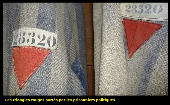 Color photo of two striped jackets with the same number, one more worn than the other, photo captioned "The red triangles worn by political prisoners."