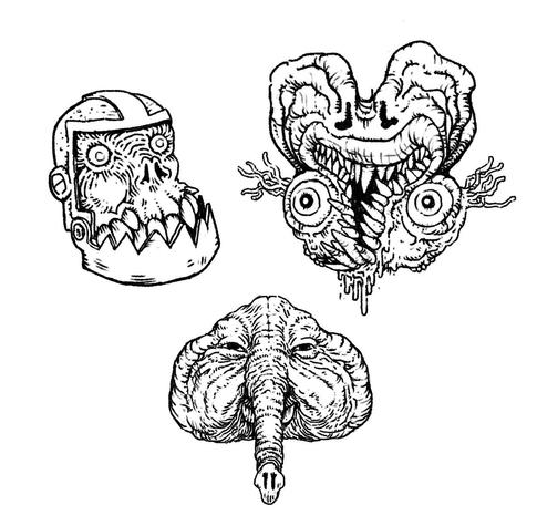 Drawings of 3 heads of terrible demons