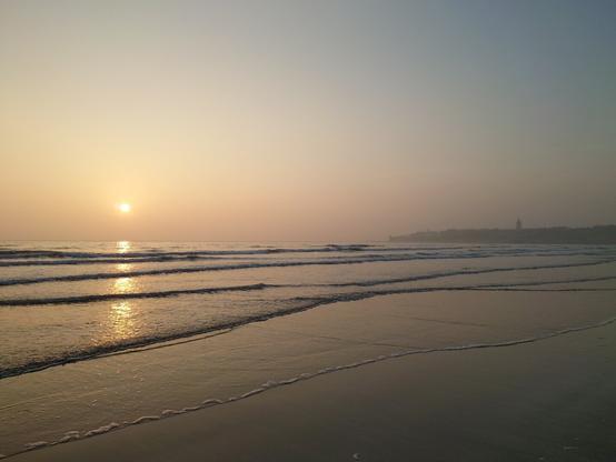 misty beach at sunrise