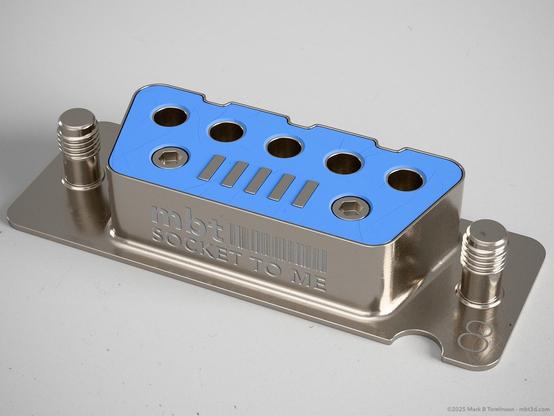 Small RS-232 type socket with 5 pin sockets and rectangular strip on the bottom edge two hex bolts on the side.
"Socket to me" inscribed on the front.