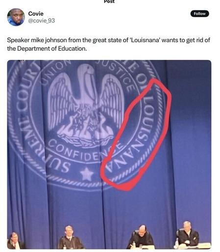 A tweet from "Covie" (@covie_93) that reads:
"Speaker Mike Johnson from the great state of 'Louisnana' wants to get rid of the Department of Education."

Below the tweet is an image of a large blue curtain featuring an emblem with a pelican and the words "SUPREME COURT" and "CONFIDENCE." The word "LOUISNANA" is prominently misspelled instead of "LOUISIANA." The mistake is highlighted with a red circle. In the foreground, three judges in black robes are seated at a table.