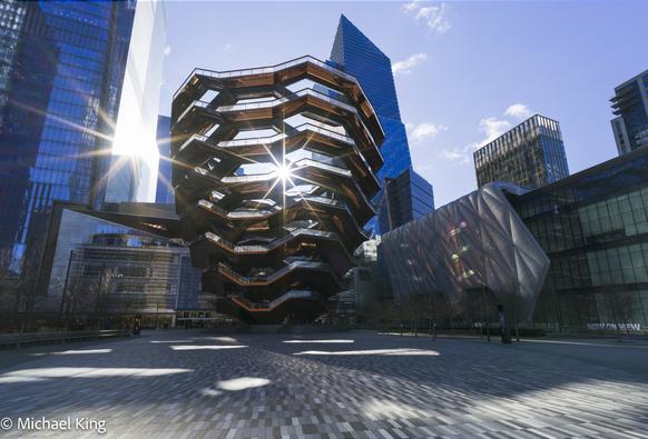 View of the vessel from the plaza level looking up in the early morning sun