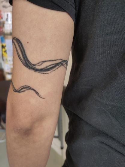 healed brushstroke with turtle swimming around the arm