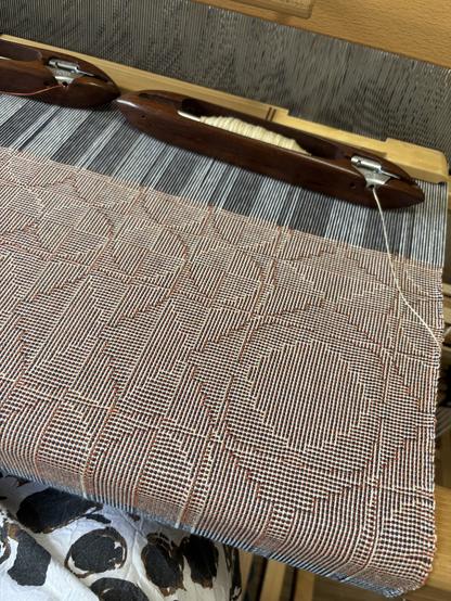 Shadow weave on the loom. Circles and diamonds.