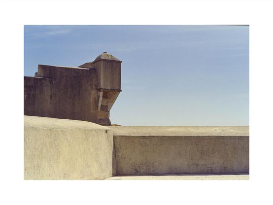 abstract viev of a castelo in beige color somewhere in portugal with walls that have no openings