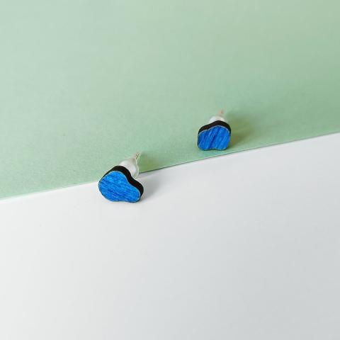 blue nugget shaped earrings made out of wood