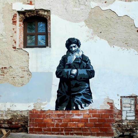 Artwork by Walls that Remember in Vilnius old town, Lithuania