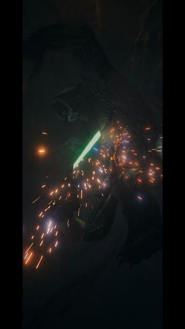 Vertical: Cal Kestis is engaged in a battle with a large creature, using a green lightsaber. Sparks and flashes of light are visible, creating a dynamic and intense atmosphere in a dark, forested environment.