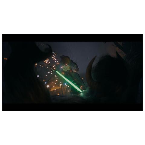 Horisontal: Cal Kestis wielding a green lightsaber is mid-fight, surrounded by sparks and glowing effects. A dark, ominous figure looms in the foreground, creating a dramatic atmosphere.