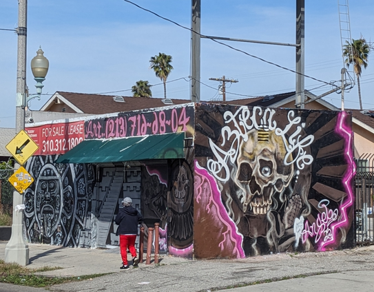 Funny and serious murals with Aztec motifs. there's a phone number to get your own