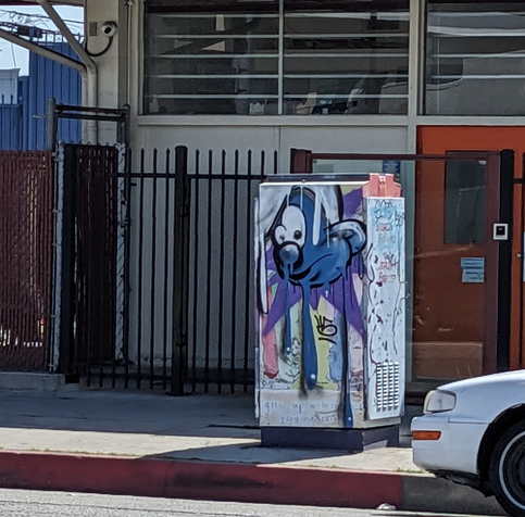 Artfully rendered Smurf on a utility box