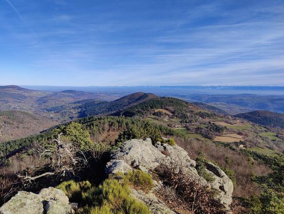 View toward Alps mountains from the summit of a mount of Ardeche