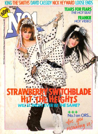 Cover of No 1 magazine with headline 'Strawberry Switchlade hit the heights' and a photo of Jill and Rose in polka dot dresses with polka dot ribbons in their hair