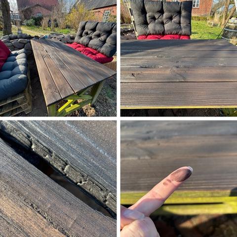 Ein Holztisch mit schwarz gekokelter Oberfläche steht draußen neben gepolsterten Sitzgelegenheiten. Nahaufnahmen zeigen die Textur und eine kleine weggebrannte Lücke auf der Oberfläche des Tisches. Ein Foto zeigt einen schwarzen Zeigefinger nachdem er über die schwarze Tischplatte gefahren ist.