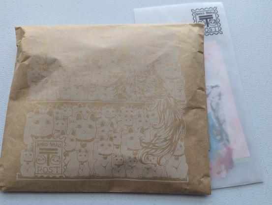 Brown envelope with lucky cats