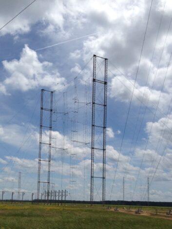 A green field with antennas. It is a curtain array antenna used by WRMI in Florida to reach Europe. Credit: Jeff White/WRMI